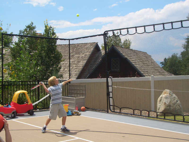 Gallery of backyard court and home gym installations featuring SnapSports